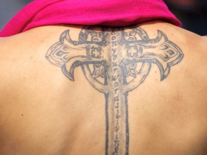 cross tattoo on back