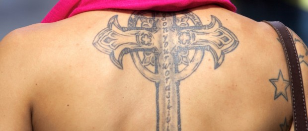 cross tattoo on back