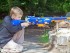 boy using Nerf sniper rifle