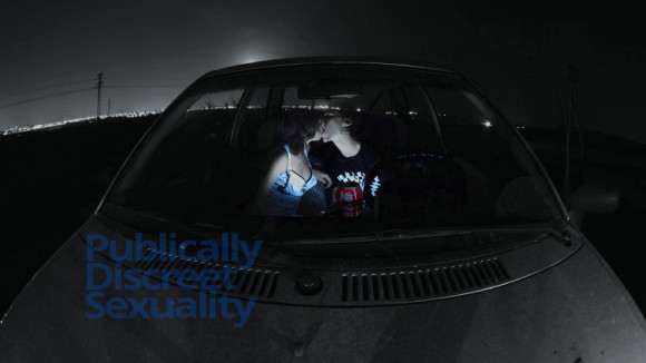 couple making out in parked car