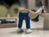 a toy plumber bending over