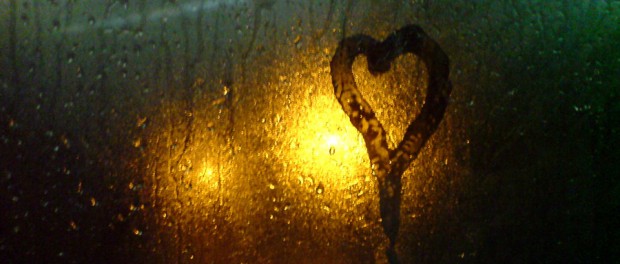 heart shape on wet window