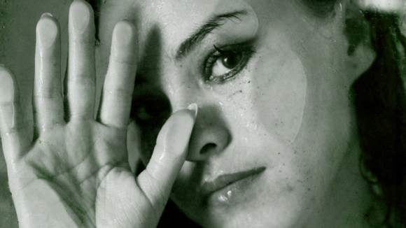 woman pressed against glass