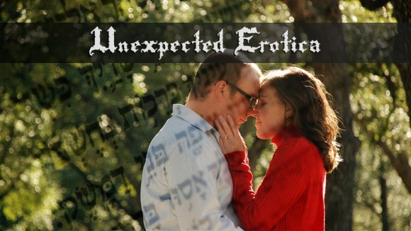 couple kissing in a wooded area